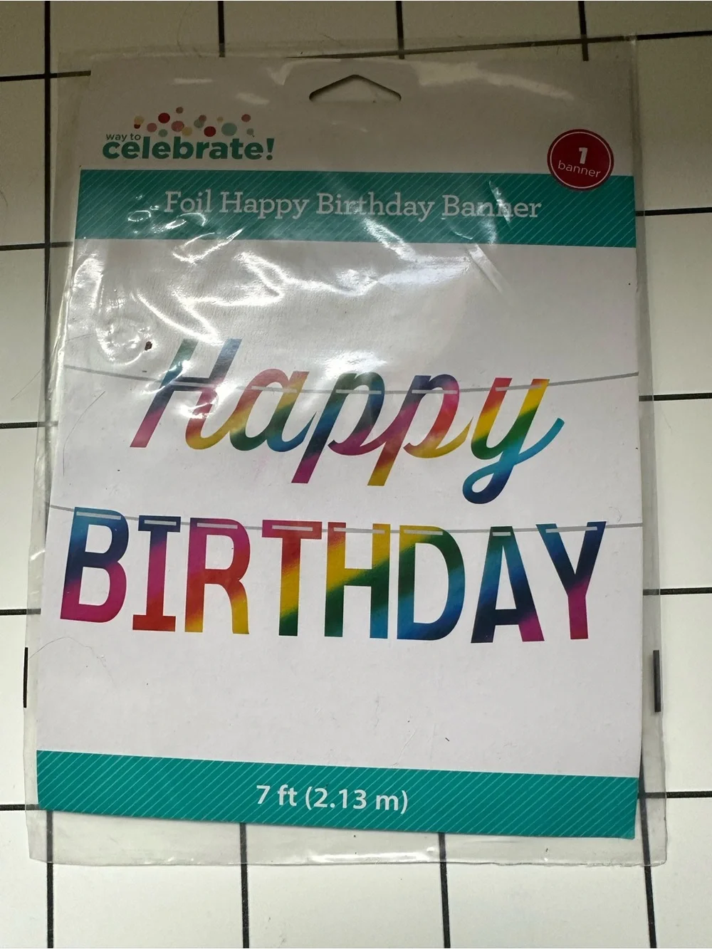 Colorful Birthday Bundle. 2 banners. 20 balloons. Candles spell HAPPY BIRTHDAY.